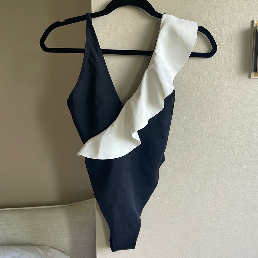 River Island Resort high leg Swimsuit with ruffle detail.